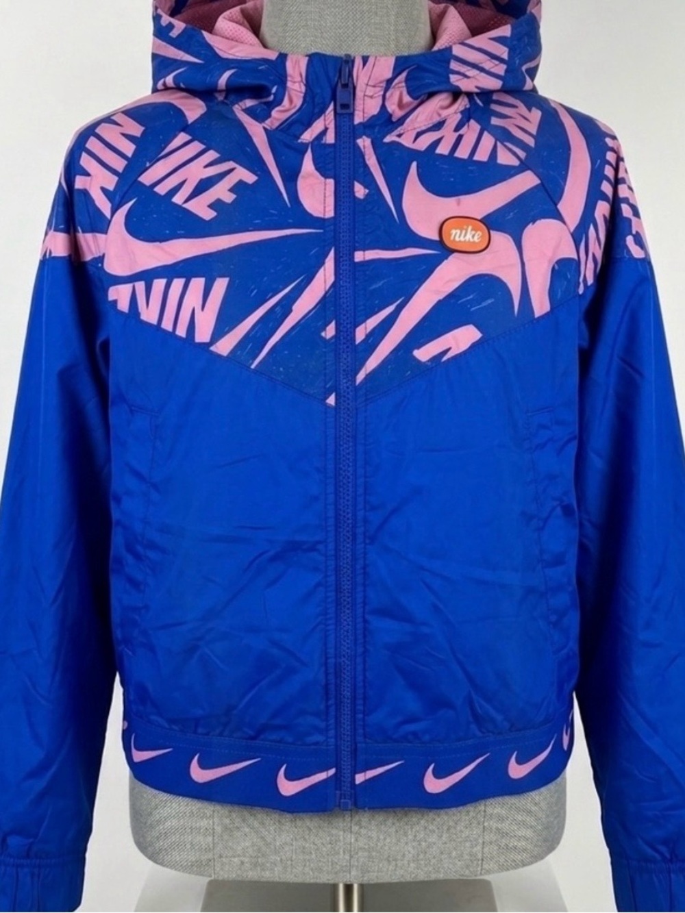 Nike Blue & Pink Logo
Windbreaker Hooded Jacket
Size Youth Large